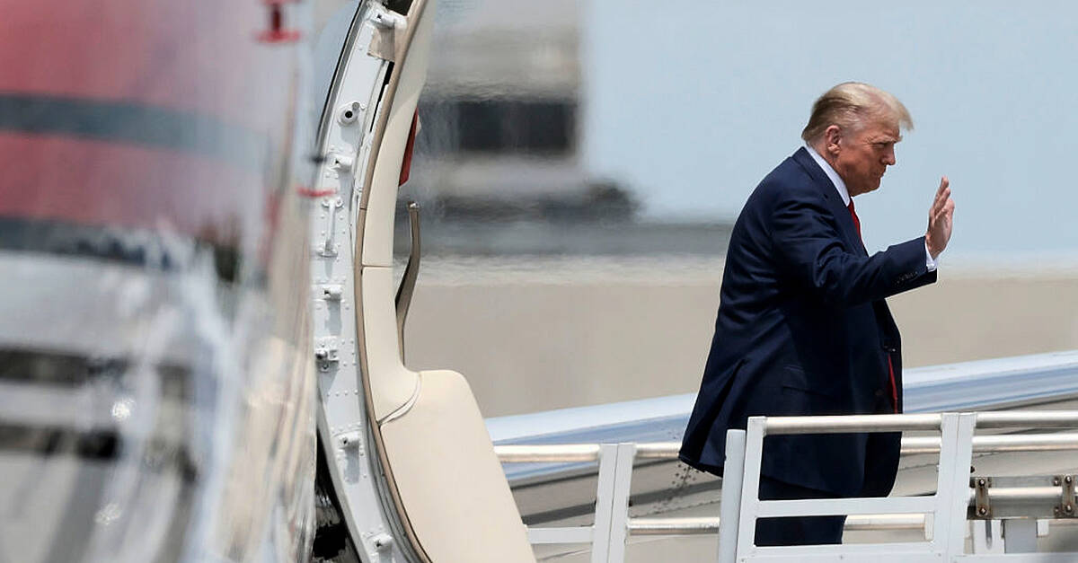 Trump arrives in Florida to face charges with crowds of 50,000 expected