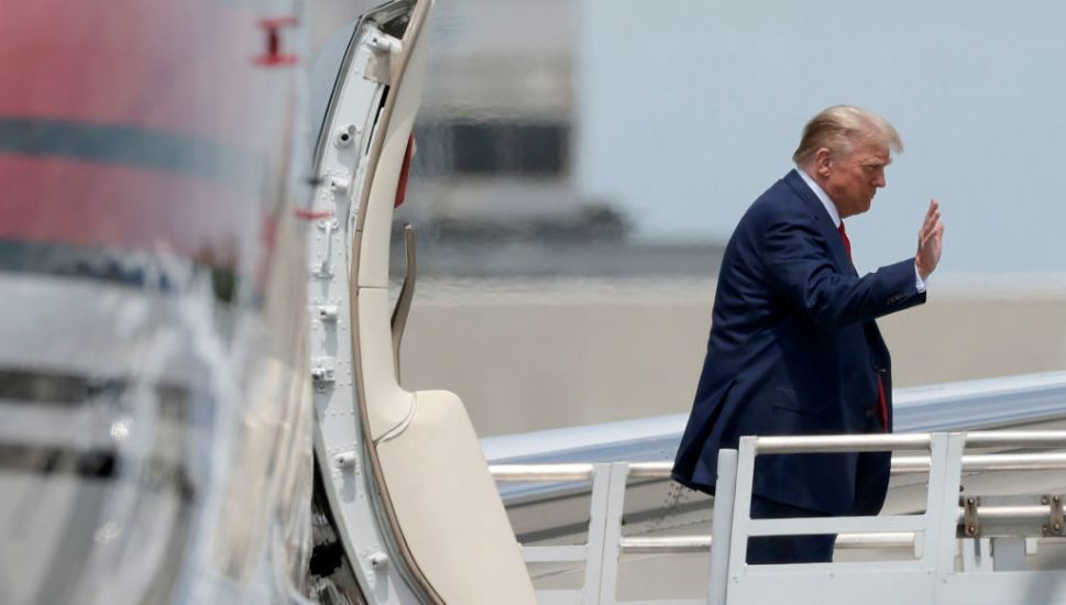 Trump Arrives In Florida To Face Charges With Crowds Of 50,000 Expected