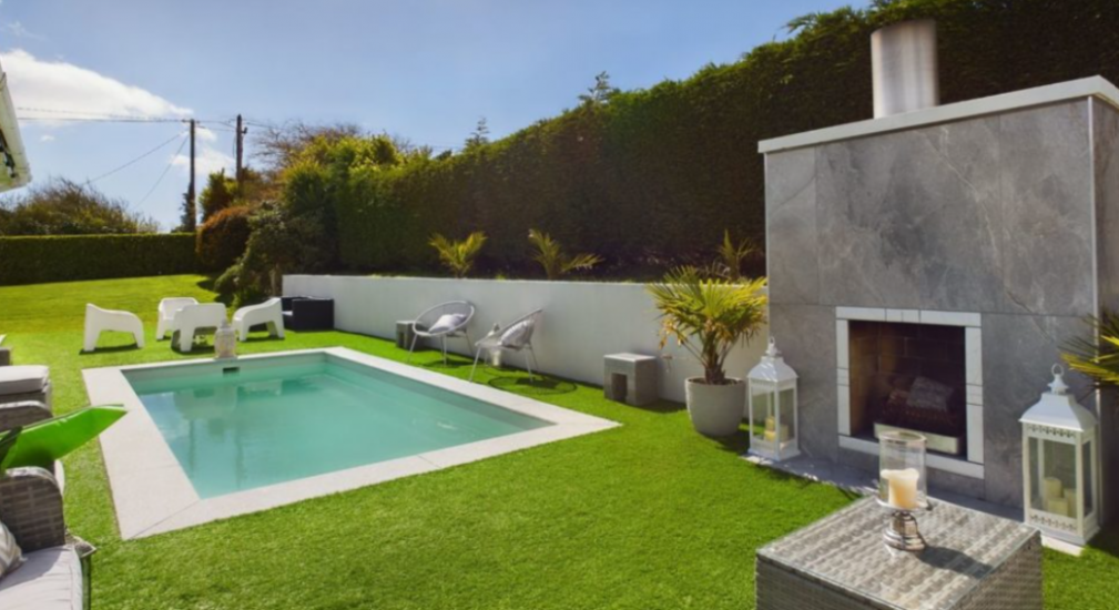 Waterford Home Offers Summer Fun With Outdoor Swimming Pool And Bar