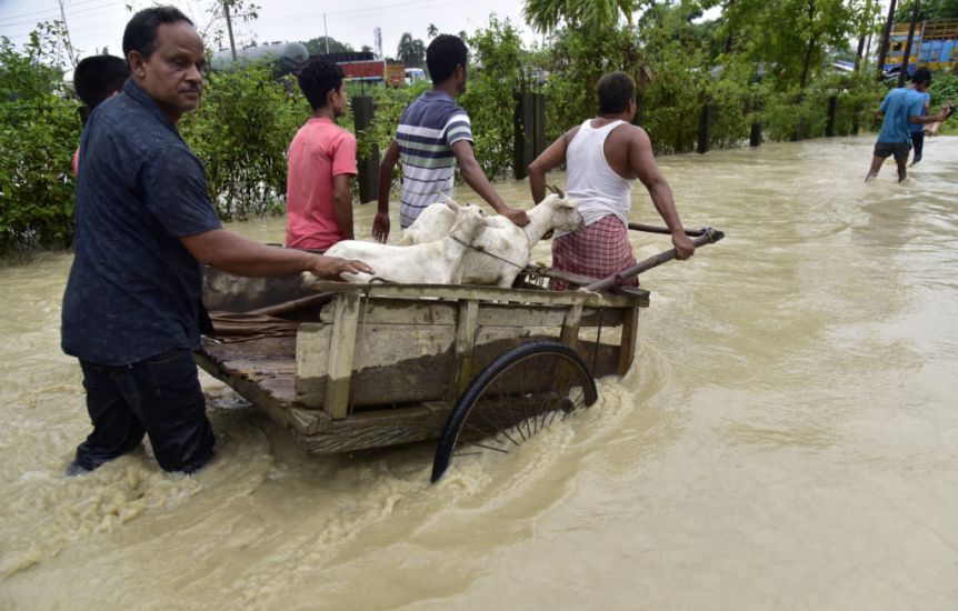 Flooding Displaces Tens Of Thousands As Monsoon Rains Batter Indian Villages