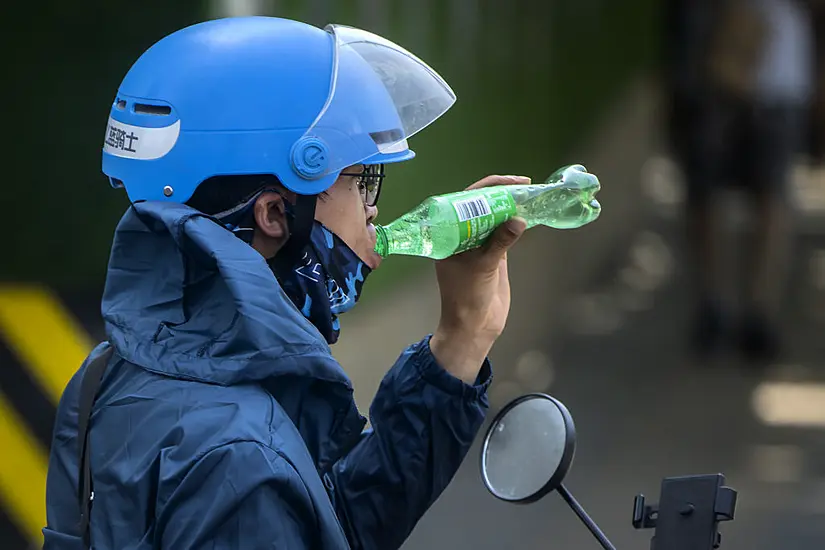 People Urged To Stay Indoors As Beijing Sizzles Amid 40-Degree Heatwave