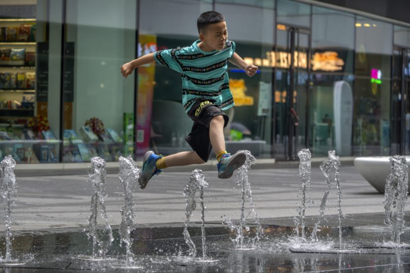 Heavy Floods Displace 10,000 In China As Beijing Gets Respite From Extreme Heat