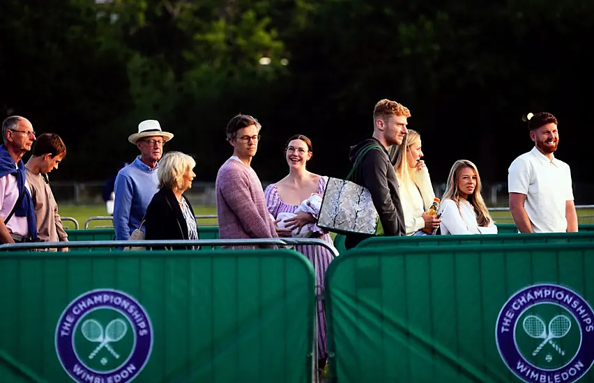 Wimbledon Fans Hoping For Fewer Showers After Rain-Hit Second Day