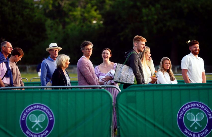 Wimbledon Fans Hoping For Fewer Showers After Rain-Hit Second Day