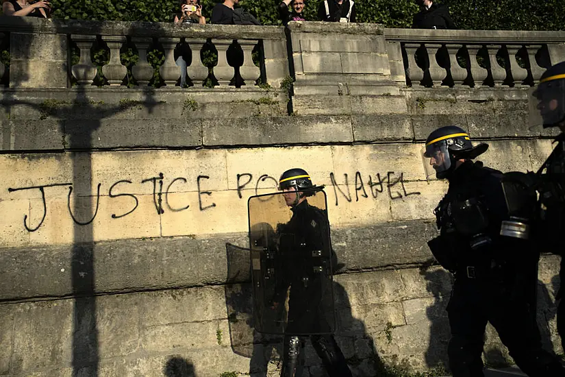 Macron Says France Needs To Address Causes Of Unrest Prompted By Police Killing