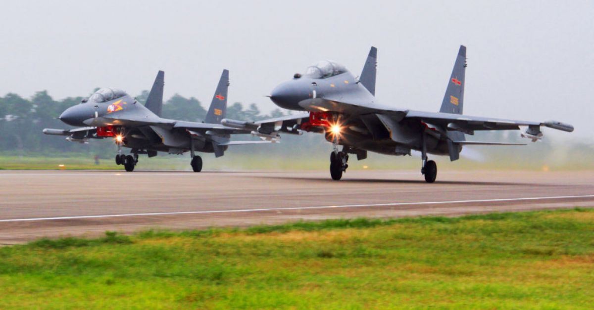 China sends warplanes and navy ships towards Taiwan in show of force