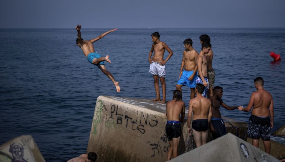 Spain Sweats Out Sultry Nights As Heatwave Bakes Southern Europe