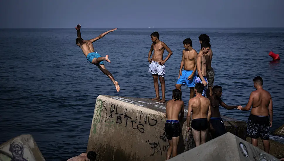 Spain Sweats Out Sultry Nights As Heatwave Bakes Southern Europe