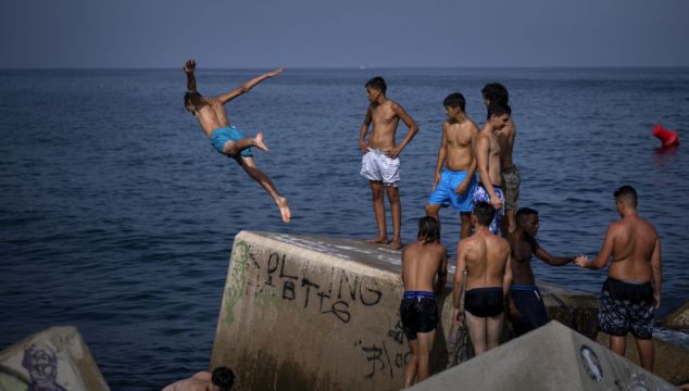 Spain Sweats Out Sultry Nights As Heatwave Bakes Southern Europe
