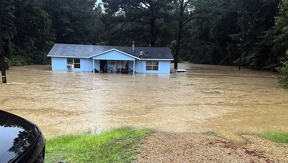 People Rescued From Homes As Rapid Rainfall Causes Flash Floods In Mississippi