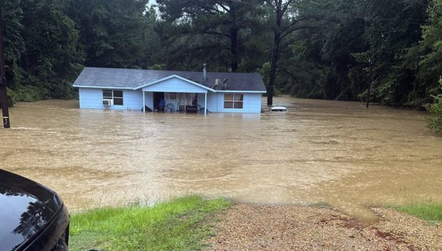 People Rescued From Homes As Rapid Rainfall Causes Flash Floods In Mississippi