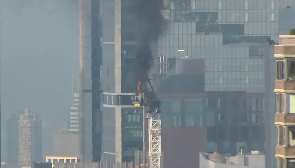 Pedestrians Scatter As Fire Causes New York Crane Arm To Crash To Street