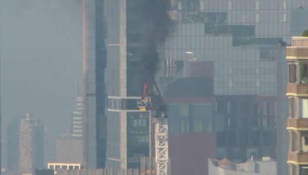 Pedestrians Scatter As Fire Causes New York Crane Arm To Crash To Street
