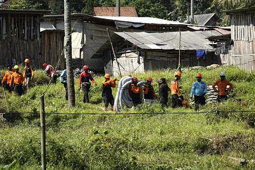 Rescuers In Indonesia Try To Reach Eight Workers Trapped In Illegal Mining Hole