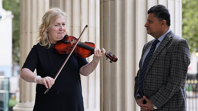 Woman Who Played Violin During Brain Surgery Reunites With Doctor