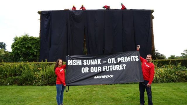 Greenpeace Scales Sunak's Manor House In Protest Against Oil Drilling 'Frenzy'