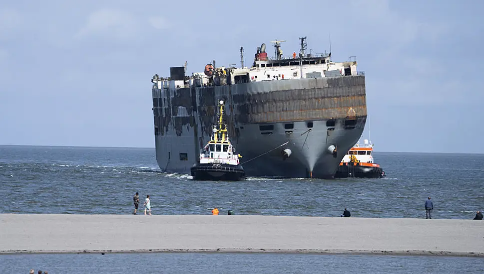 Car-Carrying Ship Towed To Dutch Port For Salvaging After Fire