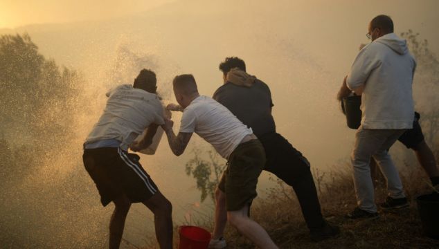 Temperatures Soar As Wildfires Force 1,400 To Evacuate In Portugal