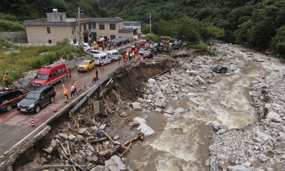 China Residents Evacuated From Homes Amid Search For More Mudslide Victims