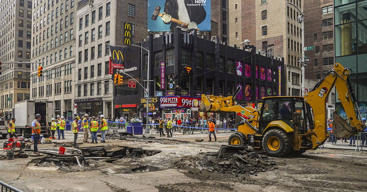 New York subway floods as 127-year-old water main gives way under Times ...