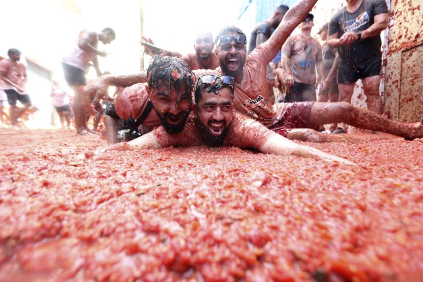 Revellers Hurl Tomatoes At Each Other In Spanish Town’s Tomatina Party