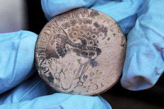 Time Capsule That Appeared To Contain Only Silt Yields Centuries-Old Coins