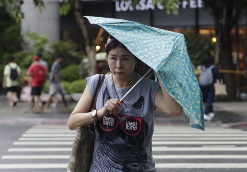 Work, Transport And Classes Suspended As Typhoon Haikui Slams Into Taiwan