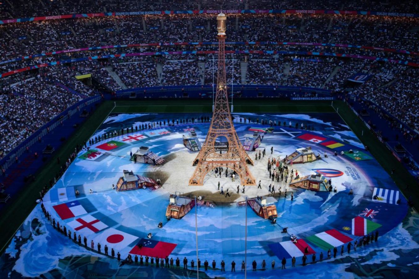 A Replica Of The Eiffel Tower During The Opening Ceremony. Photo: Getty