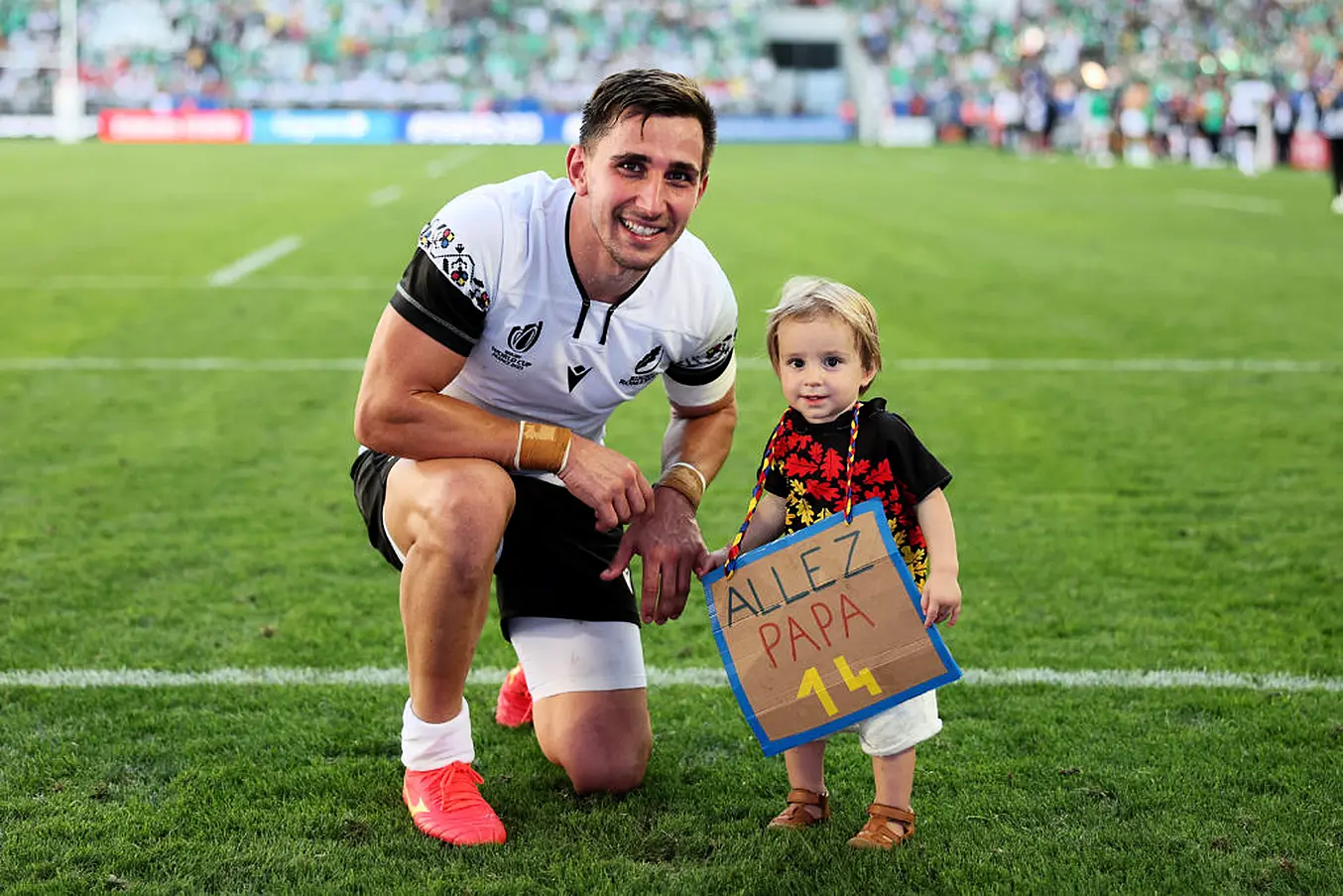 Romania's Nicholas Onutu With His Child After The Ireland Game. Photo: Getty