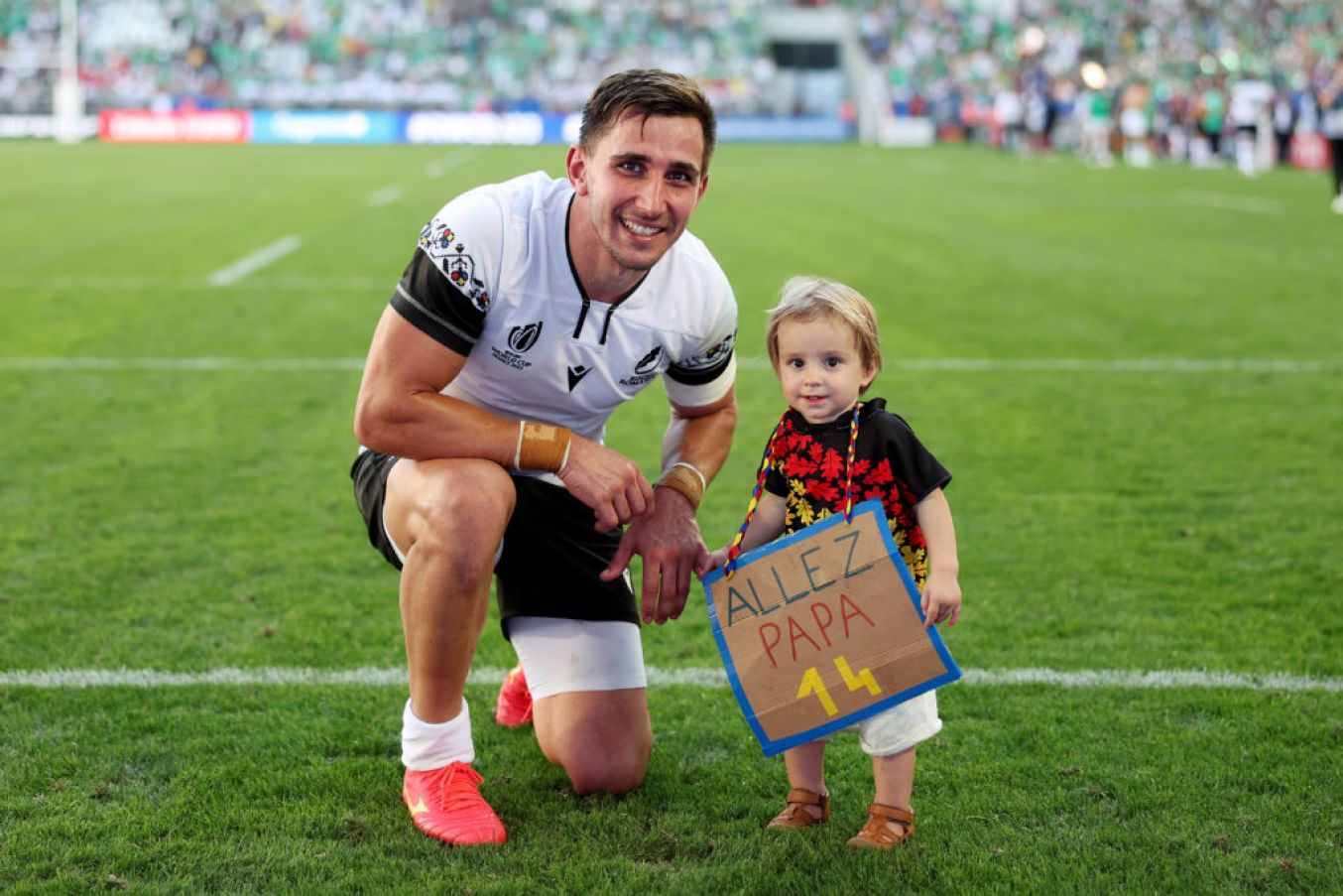 Romania's Nicholas Onutu With His Child After The Ireland Game. Photo: Getty