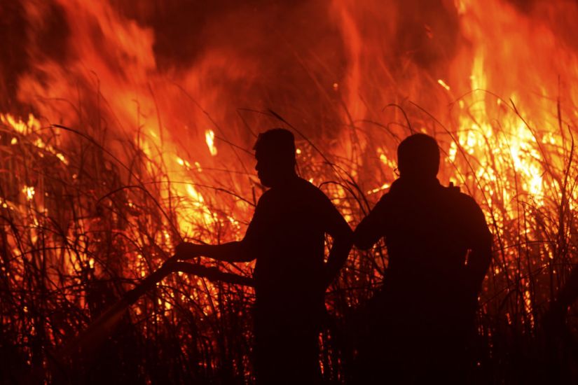 Firefighters Battle Peatland Blazes On Indonesian Island Of Sumatra