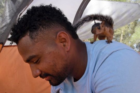Venezuelan Faces Having To Part With Pet Squirrel After Making It To Us Border