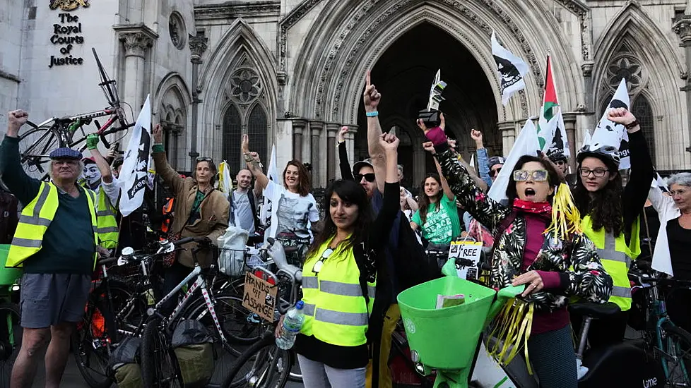 Friends Call Julian Assange Imprisonment ‘Outrageous’ At Bike Protest