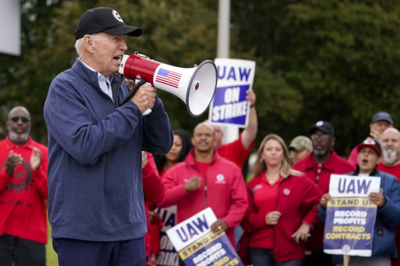 Biden Visits Car Workers’ Picket Line In Michigan As Strike Continues