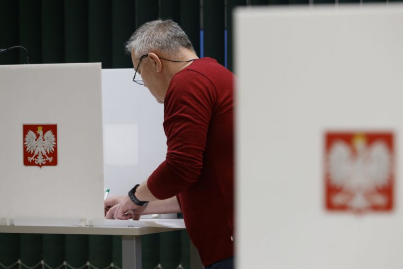 Poles Vote In Election As Right-Wing Party Seeks Third Term