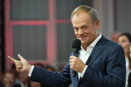 Poles Vote In Huge Numbers For Centrist Opposition