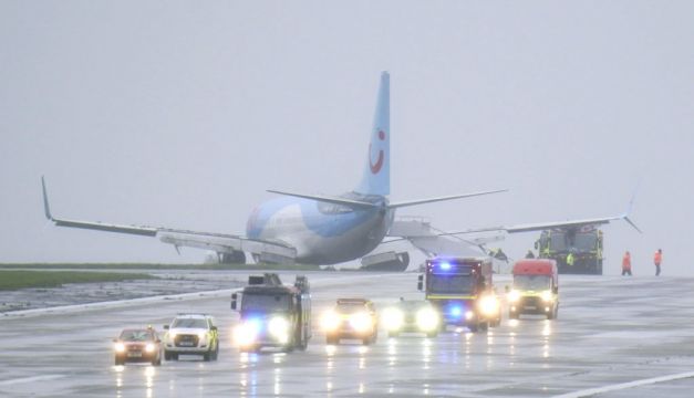 Plane Skids Off Runway During Storm Babet