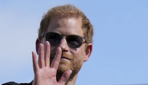 Britain's Prince Harry Makes Behind The Scenes Visit To Us Grand Prix