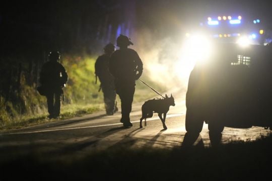 Heavily Armed Police Surround Home In Search For Maine Shooting Suspect