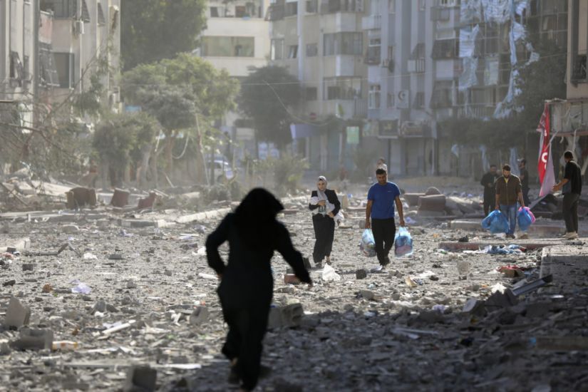 Israeli Troops Continue Ground Attacks In Gaza As 800,000 Flee Area Under Siege