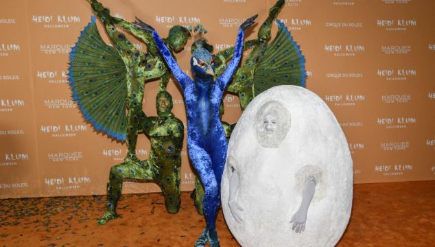 Queen Of Halloween Heidi Klum Recruits Acrobats For Peacock Costume