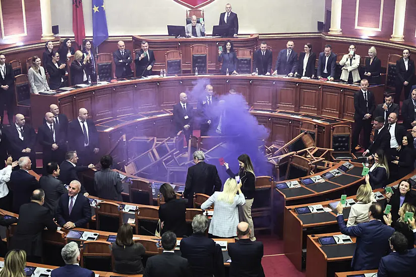 Opposition Politicians Throw Firecrackers And Chairs In Parliament Protest