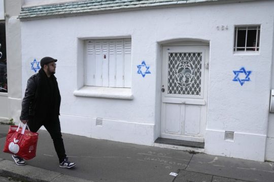 France Blames Russia Over Bot Campaign Linked To Antisemitic Graffiti