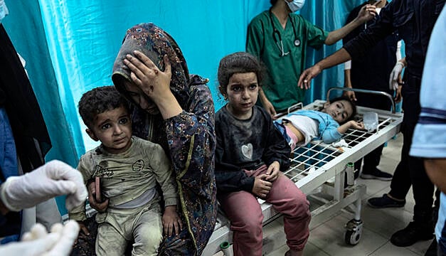 Thousands Flee Gaza’s Main Hospital But Hundreds Still Trapped By Fighting