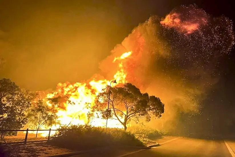 Dozens Evacuated As Australian Wildfire Burns Out Of Control