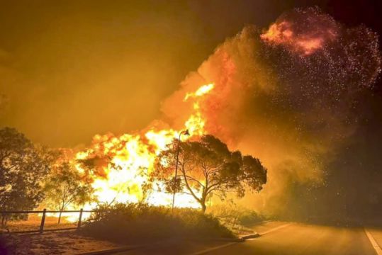 Dozens Evacuated As Australian Wildfire Burns Out Of Control