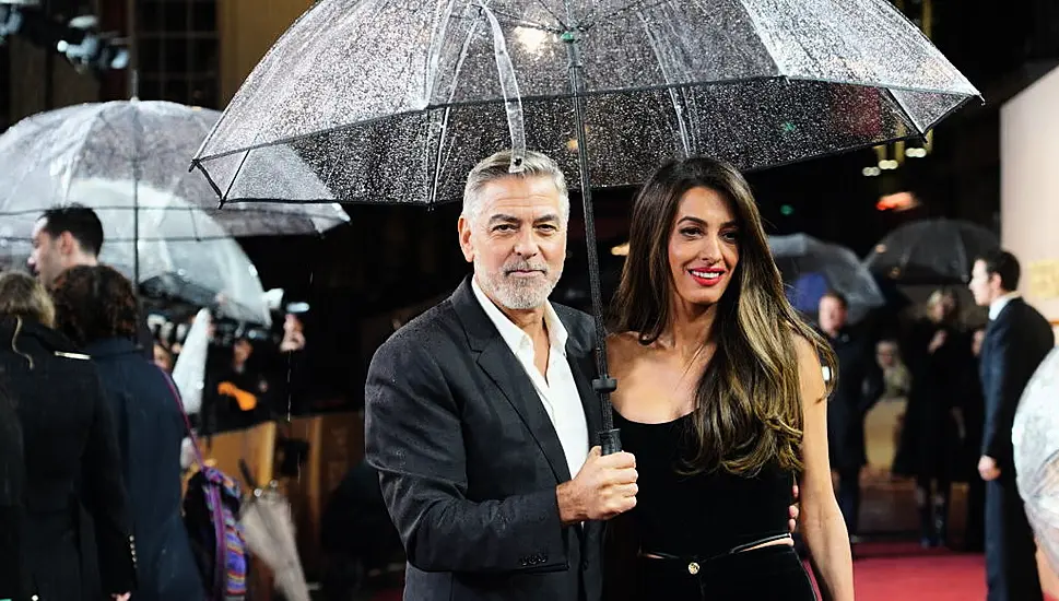 George And Amal Clooney Brave British Rain For Screening Of The Boys In The Boat