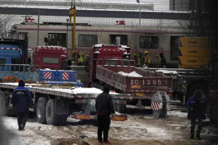 More Than One Hundred Hurt In Beijing Subway Crash As Heavy Snow Hits Capital
