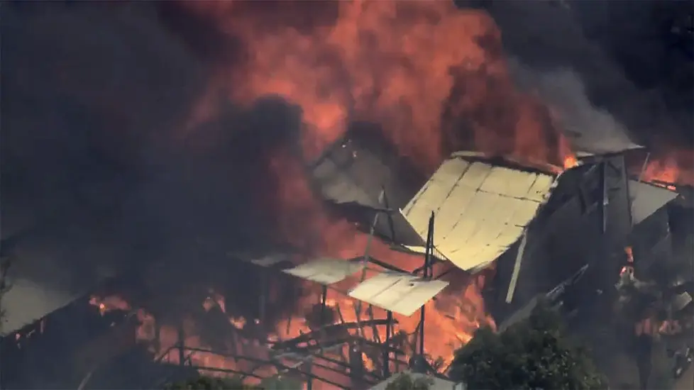 Two Injured And Homes Destroyed As Australian Wildfire Burns Out Of Control