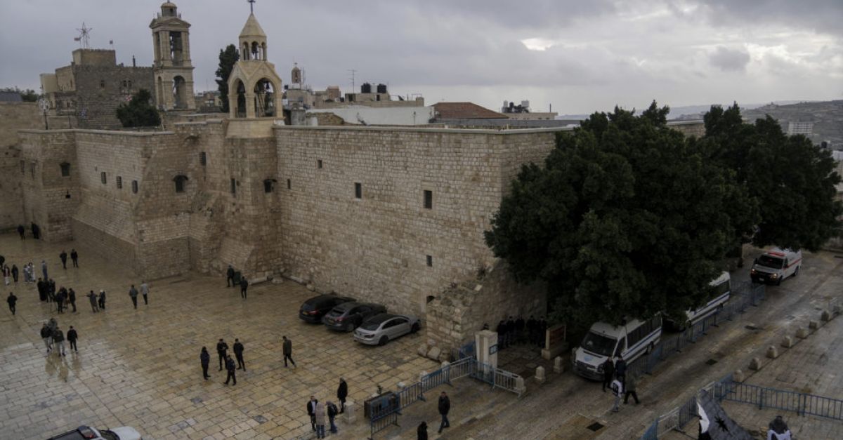 In Pictures: Christmas celebrations begin worldwide but are muted in Bethlehem